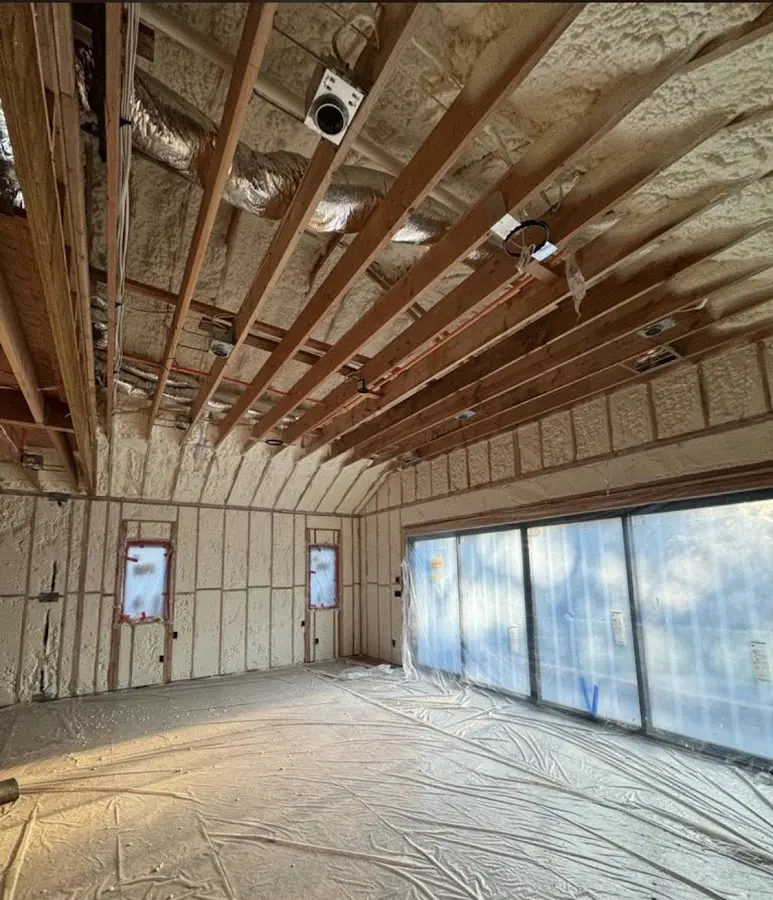 Interior walls and ceiling insulated with spray foam during new construction in Lackawanna